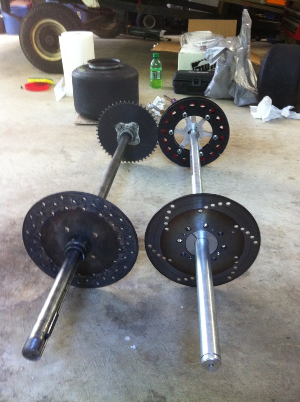 Old, steel axle assembly is on the right weighing in at 15.5lbs. The new aluminum axle assembly is only 6.5lbs. 